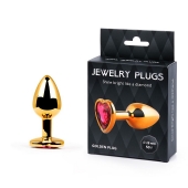 Золотистая анальная пробка с малиновым кристаллом-сердечком - 7 см. - Anal Jewelry Plug - купить с доставкой в Орле